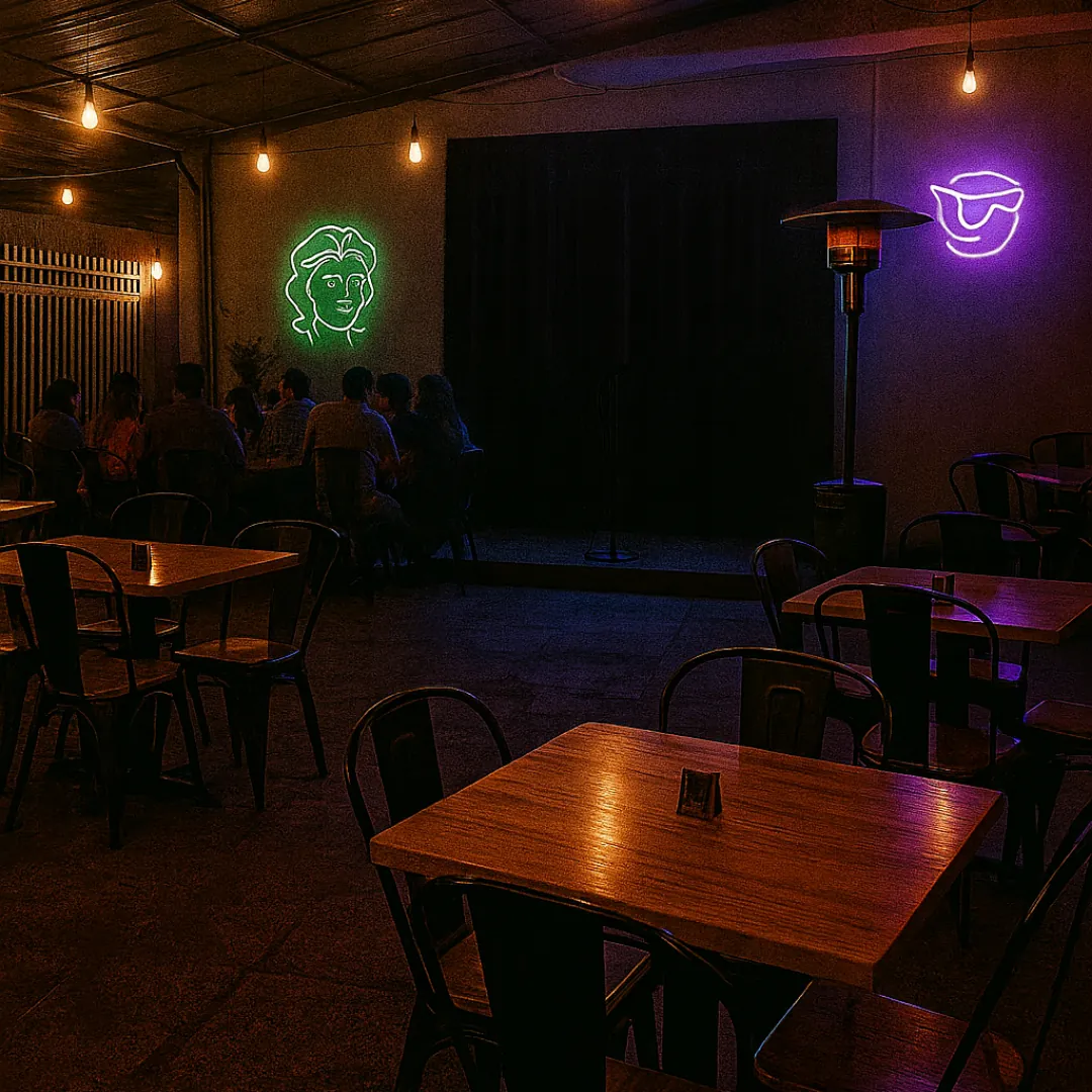 Fondo stand-up comedy Minerva Club — escenario con neon